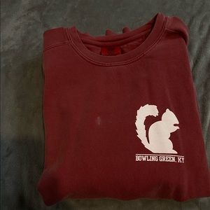 Faded red WKU sweater